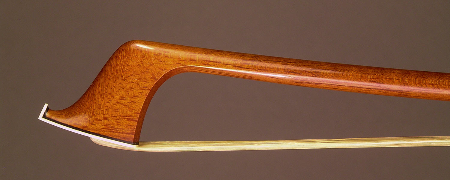 Viola Bow with a round Amourette (unfigured snakewood) stick, gold-mounted ebony frog with inlayed sides and divided button.