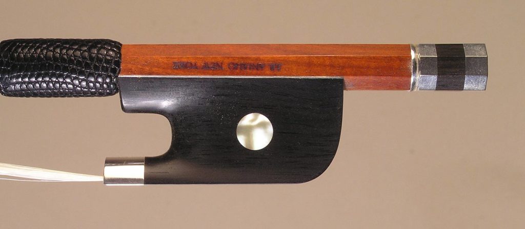 Cello Bow silver-mounted ebony frog with plain eyes and divided button.
