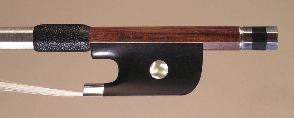 Cello Bow silver-mounted ebony frog with plain eyes and divided button.