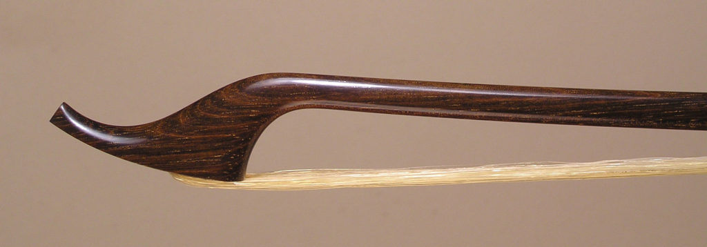 Classical Cello Bow with round bannia (Swartzia bannia) stick, open trench ebony frog and greenheart button.