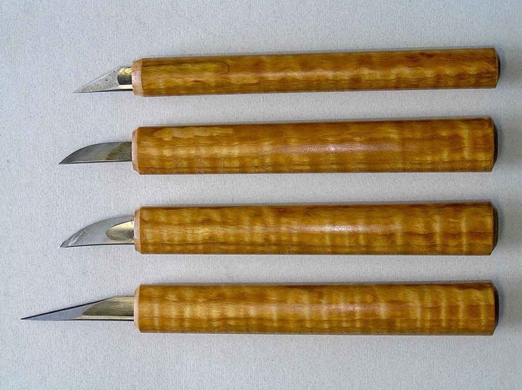 Set of 4 bow making knives with matching curly maple handles