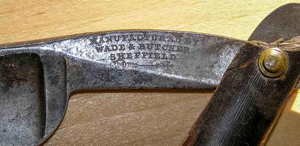 Close up of the Wade and Butcher straight razor’s branded blade