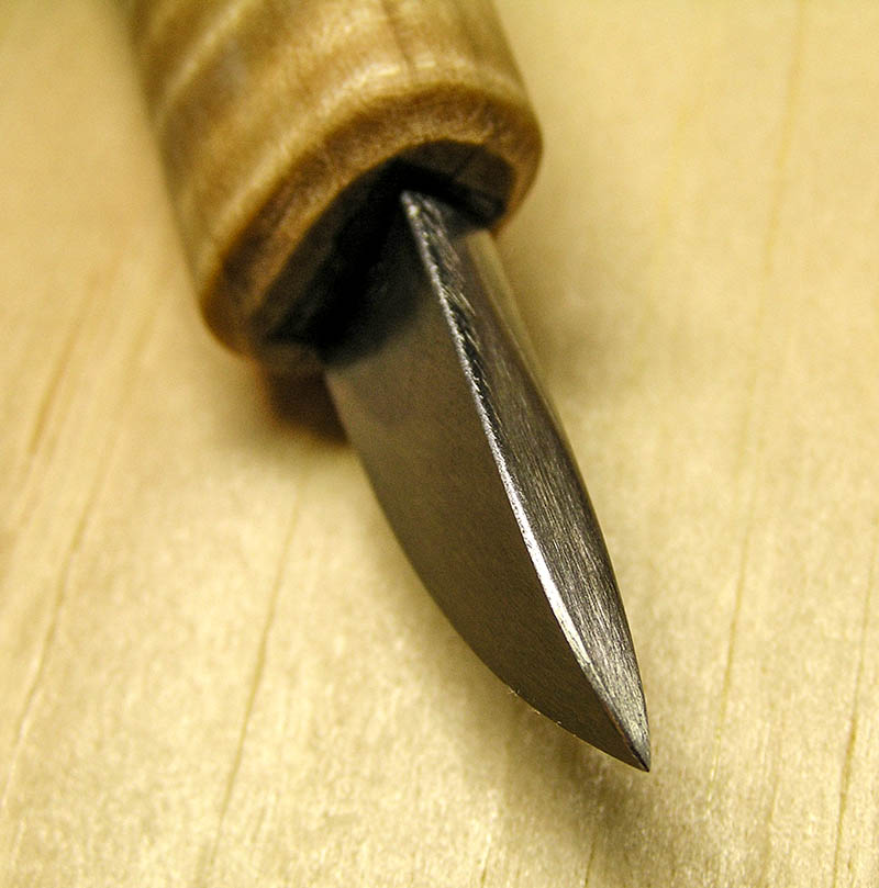 Another view of curved double bevel knife tip